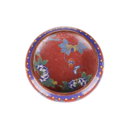 75 - A large Chinese circular cloisonne bowl of shallow biconvex form, late Qing Dynasty, early 20th cent... 