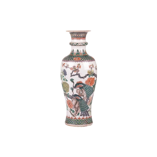 88 - A large Chinese Famille Verte baluster vase, Qing Dynasty, late19th century, painted with a pair of ... 