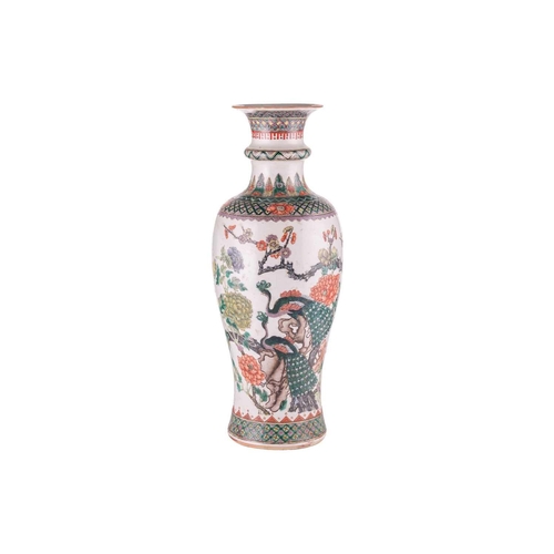 88 - A large Chinese Famille Verte baluster vase, Qing Dynasty, late19th century, painted with a pair of ... 