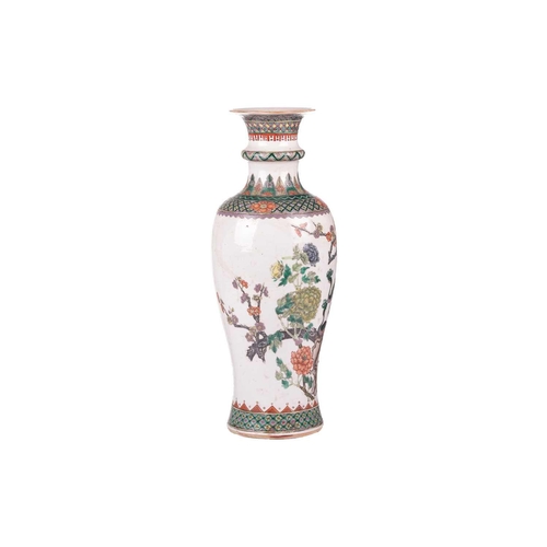 88 - A large Chinese Famille Verte baluster vase, Qing Dynasty, late19th century, painted with a pair of ... 