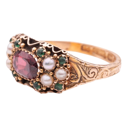 1 - A gem-set ring, the central oval-shaped garnet flanked by trios of half-pearl, one replacement with ... 