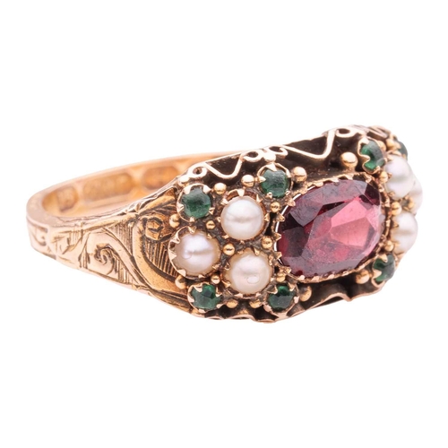 1 - A gem-set ring, the central oval-shaped garnet flanked by trios of half-pearl, one replacement with ... 