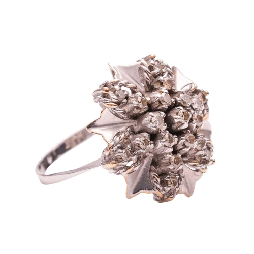 117 - A diamond-set cluster ring, with twisted rope details, adorned with illusion-set brilliant-cut diamo... 