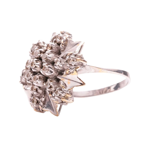 117 - A diamond-set cluster ring, with twisted rope details, adorned with illusion-set brilliant-cut diamo... 