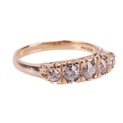 122 - An old-cut diamond half-hoop ring in 9ct gold, comprising five graduated old-cut diamonds with an es... 