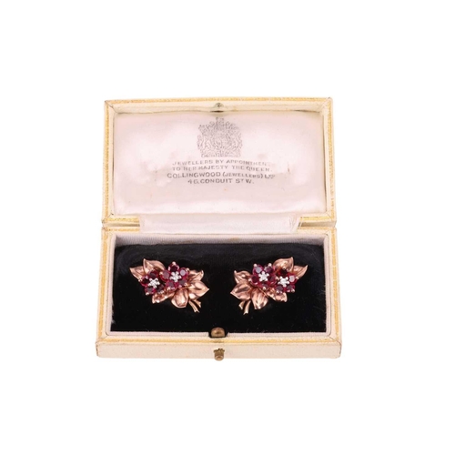 128 - A pair of floral spray earrings set with a mixed of natural and synthetic rubies, circa 1950s, each ... 