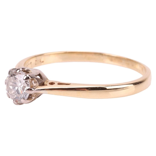 129 - A diamond solitaire ring, the central round brilliant diamond measuring approximately 5.1mm, with an... 