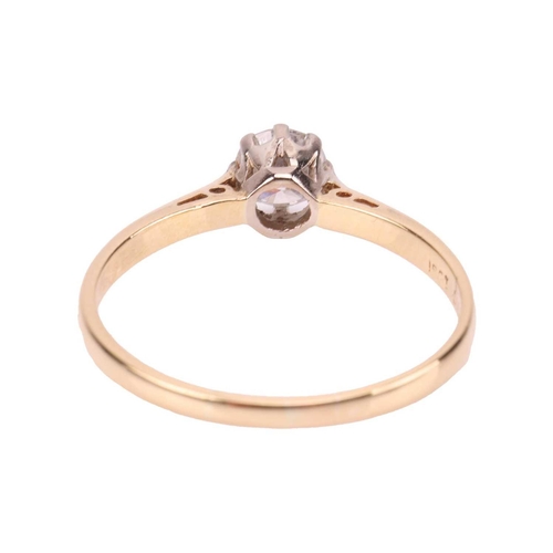 129 - A diamond solitaire ring, the central round brilliant diamond measuring approximately 5.1mm, with an... 