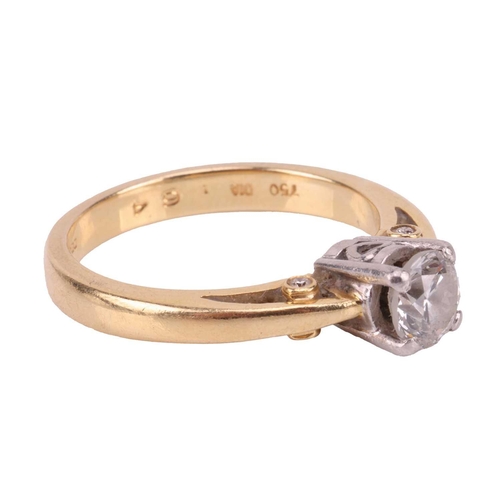 13 - A diamond solitaire ring, featuring a round brilliant diamond measuring approximately 5.25mm, with a... 