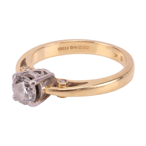 13 - A diamond solitaire ring, featuring a round brilliant diamond measuring approximately 5.25mm, with a... 