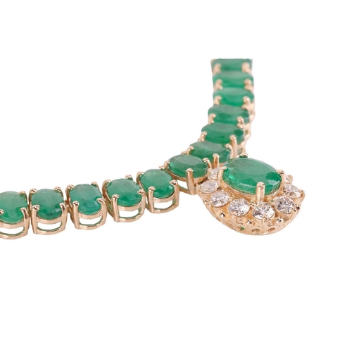 145 - An emerald and diamond necklace, composed of ninety six oval mixed-cut emeralds in a line of articul... 