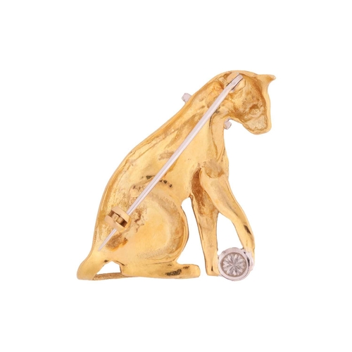 150 - A diamond-set cat brooch, set in 18ct gold, embossed in the form of a sitting cat playing with a bal... 