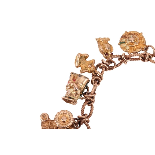 16 - A 9ct gold charm bracelet, comprising a cable link chain with twisted rope design, suspending thirte... 