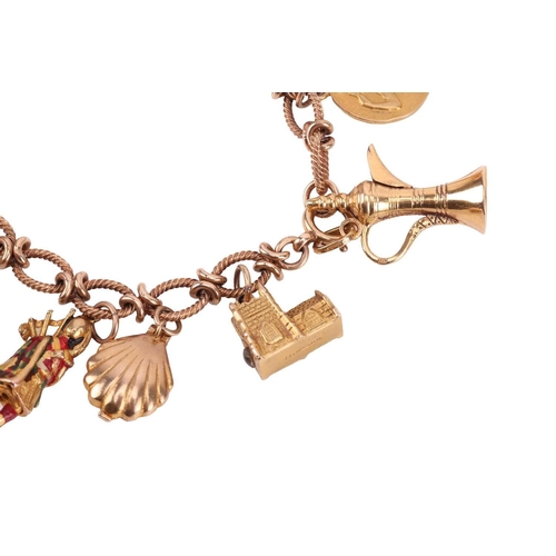 16 - A 9ct gold charm bracelet, comprising a cable link chain with twisted rope design, suspending thirte... 