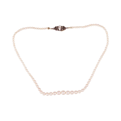 164 - A cultured pearl necklace, the graduated pearls of cream body, measuring approximately 3.3mm to 7.4m... 