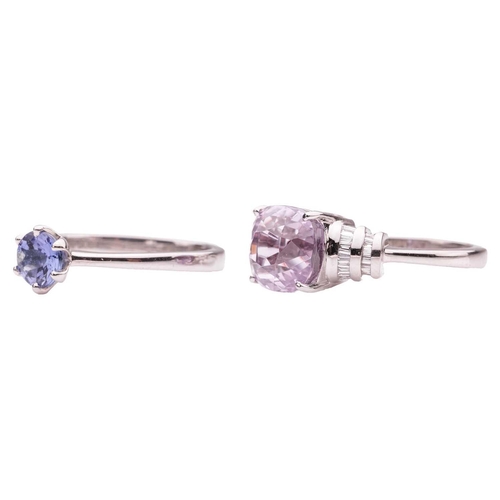 165 - Two gem-set dress rings in platinum; the first ring comprising a cushion-cut kunzite 9.5 x 8.8 x 7.9... 