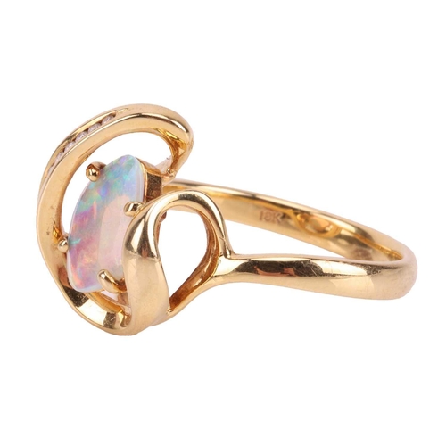 173 - An opal and diamond dress ring, featuring a free-form precious opal slice of 10.1 x 7.0 x 1.1 mm, di... 