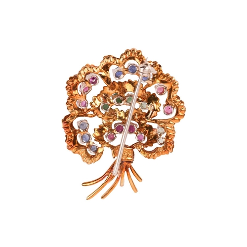 181 - A gem-set brooch in the form of a stylised bouquet, set with circular-cut rubies, emeralds and sapph... 