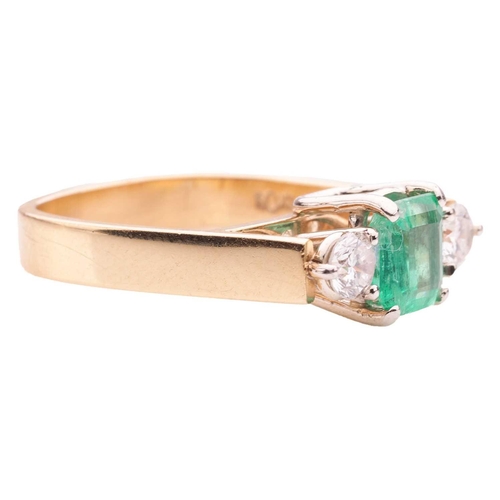 19 - A modern emerald and diamond trilogy ring, comprising a step-cut emerald with canted corners, of bri... 