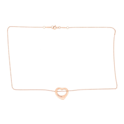 199 - Tiffany & Co. - a diamond-set open heart pendant on chain, by Elsa Peretti, set with graduated diamo... 