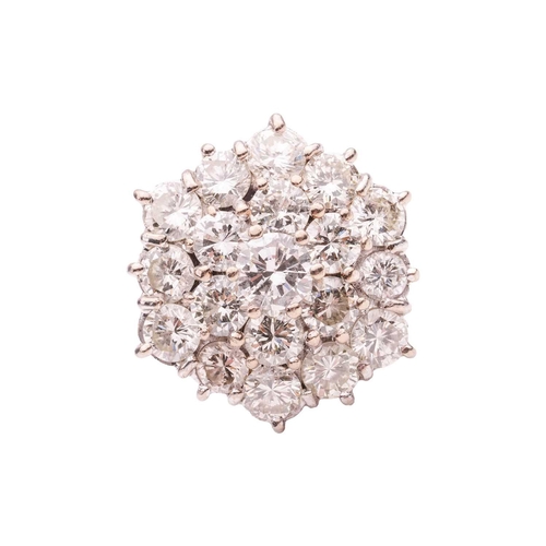 200 - A diamond-set floral cluster ring, featuring nineteen round brilliant diamonds, with an estimated to... 