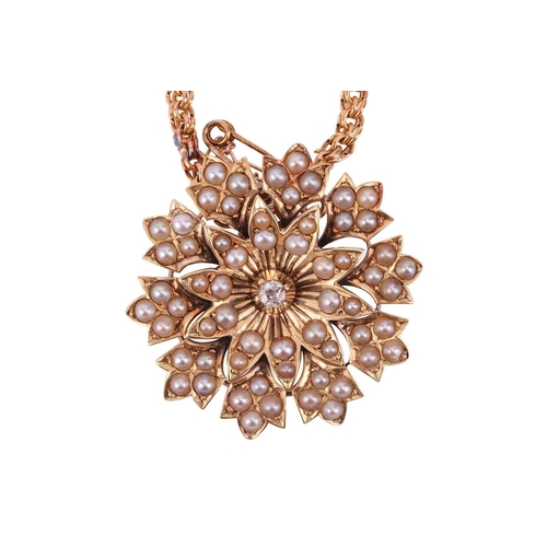 253 - A flowerhead pendant on chain, the tiered floral mount with petals encrusted with split pearls, supe... 