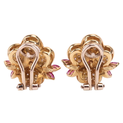 255 - A pair of ruby and diamond floral earrings, each flowerhead pavé-set with round brilliant-cut diamon... 