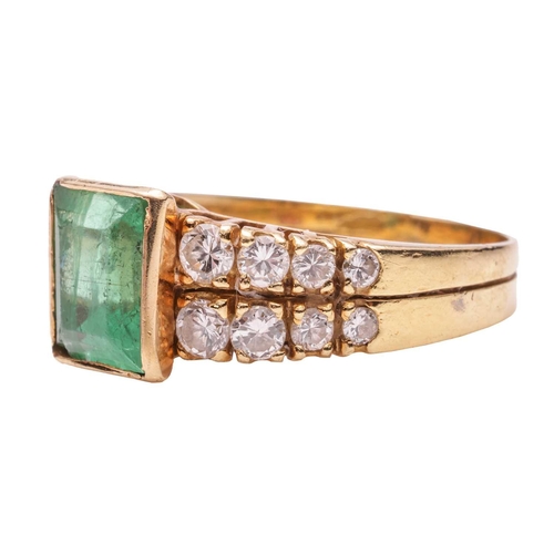 258 - An emerald and diamond dress ring, featuring a step-cut emerald in collet, approximately measuring 8... 