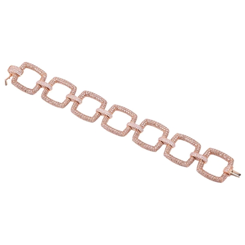 261 - A diamond-set bracelet, composed of seven square panels pave-set throughout with brilliant-cut diamo... 