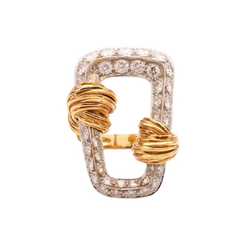 263 - Kutchinsky - a diamond-set cocktail ring, set in 18ct gold, of trapezoidal buckle form, encrusted wi... 