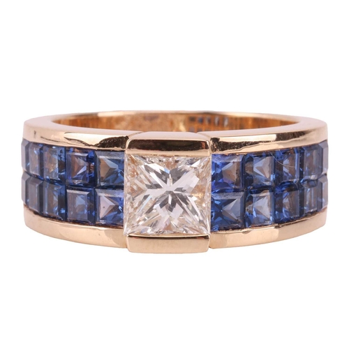 269 - Moussaieff - a diamond and sapphire dress ring, centred with a princess-cut diamond in a raised moun... 