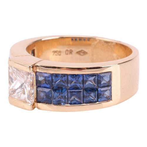 269 - Moussaieff - a diamond and sapphire dress ring, centred with a princess-cut diamond in a raised moun... 