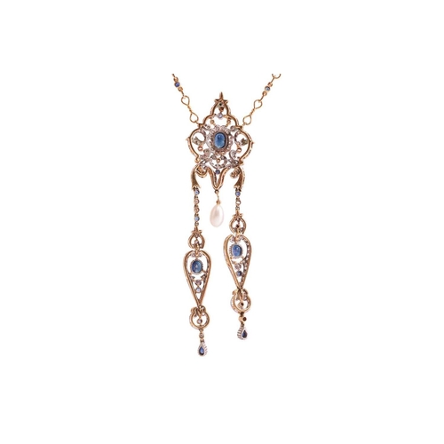 33 - A diamond and sapphire-set négligée necklace, the central pendant featuring an oval dark blue sapphi... 