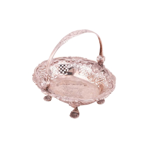 345 - A George II silver swing-handled sweat meat basket, by James Morrison, the handle and rim cast with ... 