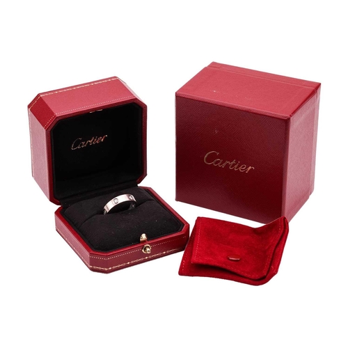 38 - Cartier - an 18ct white gold 'Love' ring set with six diamonds, the polished flat band flush-set wit... 