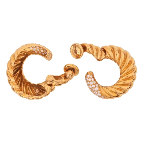 42 - Van Cleef & Arpels - a pair of diamond-set hoop earrings in 18ct yellow gold, of twisted rope design... 