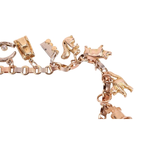 46 - A charm bracelet, comprising a three-toned textured cable link chain with spring-ring clasp, suspend... 