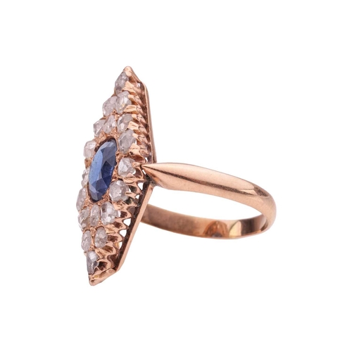 49 - A diamond and paste panel ring, the lozenge-shaped ring head centred with an oval-cut blue paste, su... 