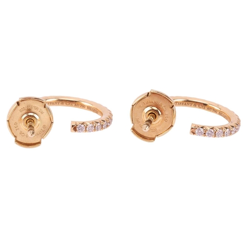 6 - Tiffany & Co. - a pair of diamond-set 'Metro' hoop earrings in 18ct yellow gold, small model, each p... 