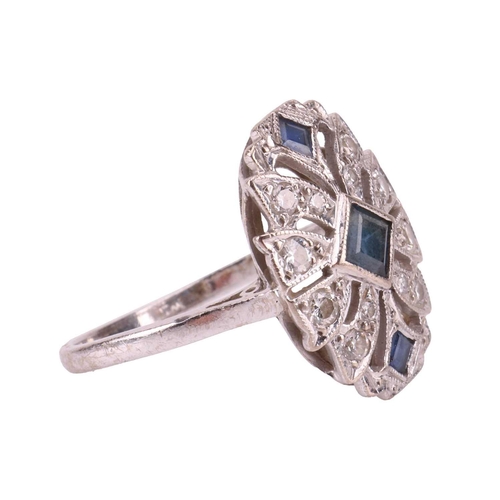 68 - A sapphire and diamond-set plaque ring, featuring three lozenge-shaped sapphires, bezel set with mil... 