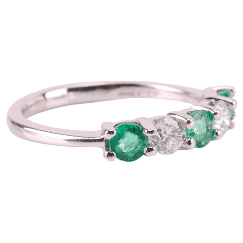 72 - An emerald and diamond five-stone ring, comprising two round brilliant diamonds set between three ro... 