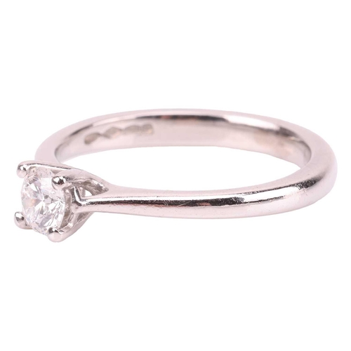 87 - A diamond solitaire ring, featuring a round brilliant diamond measuring approximately 4.8mm with an ... 