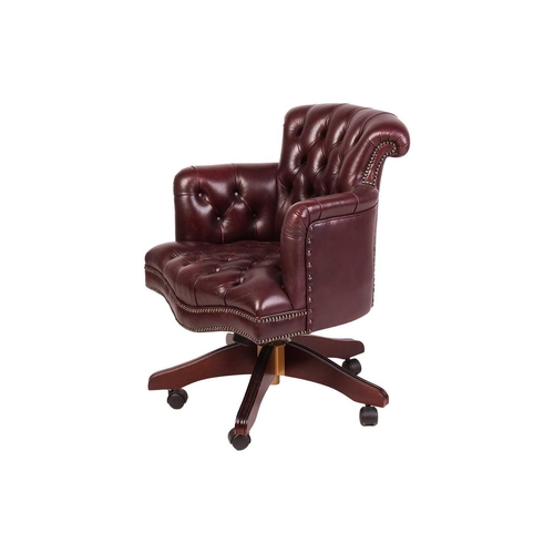 101 - A George Smith of London deep buttoned hide Captain's Swivel Chair, with close nailed dark tan uphol... 