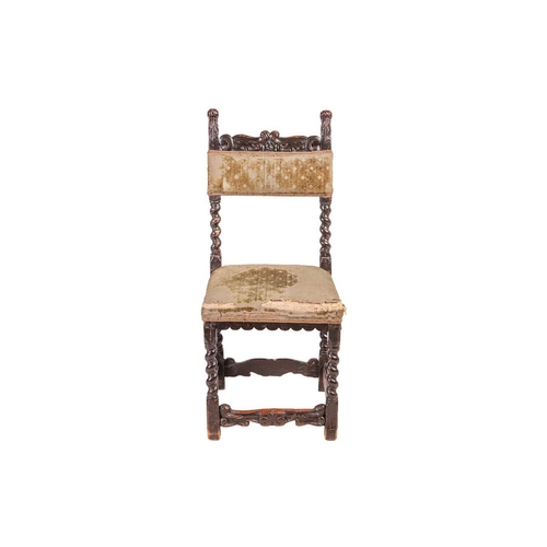 106 - A Charles I documentary walnut side chair, by repute formerly in the ownership of Charles I, bearing... 