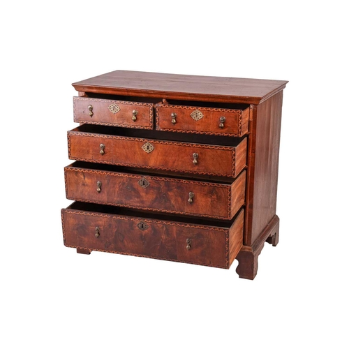 115 - An early 18th-century walnut chest of two short over three long drawers each with 