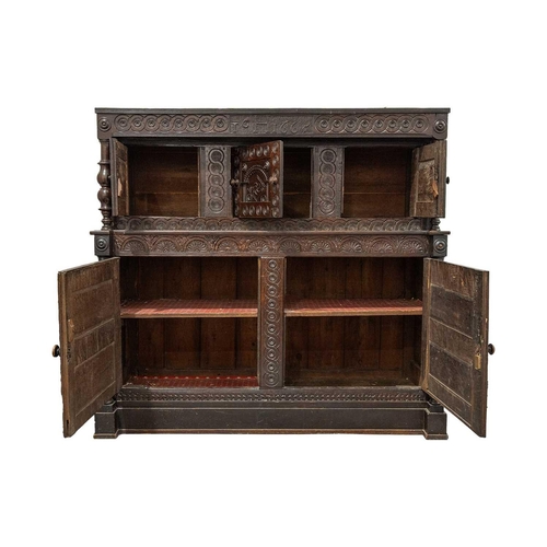 120 - A Large 17th century and later oak Court Cupboard, dated 1665, with guilloche and lozenge carving, t... 