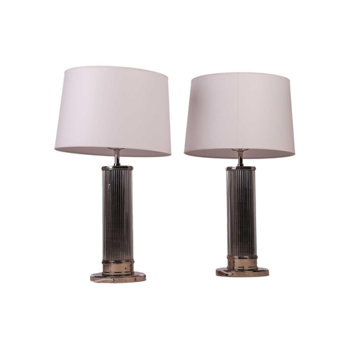 136 - Ralph Lauren Collection; a pair of 'Allen' table lamps, contemporary, in polished nickel with glass ... 