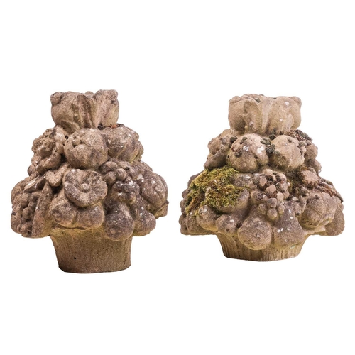 110 - A pair of reconstituted stone decorative bouqet finials, 35 cm high.