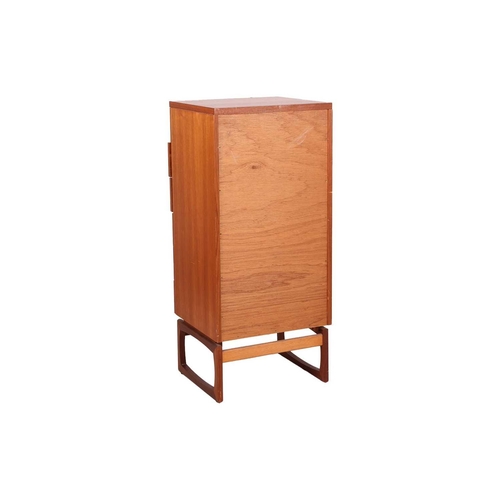 113 - A composite suite of mid-century teak and teak effect furniture, comprising a sideboard, extending d... 