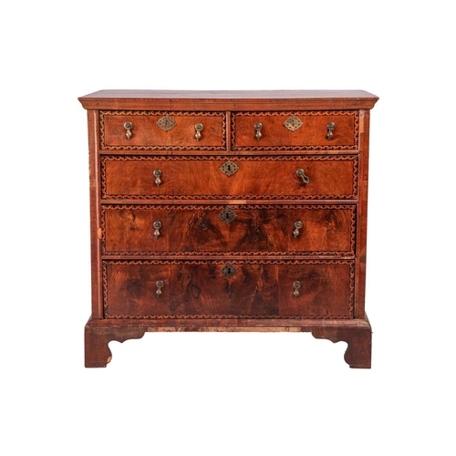 115 - An early 18th-century walnut chest of two short over three long drawers each with 